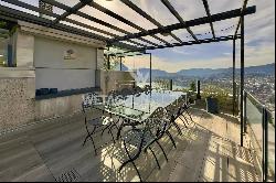 Lugano-Aldesago: modern penthouse apartment for sale with stunning lake views, rooftop te