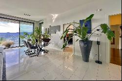 Lugano-Aldesago: modern penthouse apartment for sale with stunning lake views, rooftop te