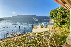 Lugano-Bissone: for sale, villa pieds dans l'eau, featuring a private pier & two addition