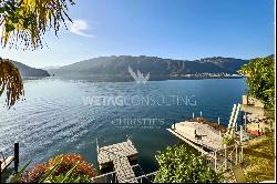 Lugano-Bissone: for sale, villa pieds dans l'eau, featuring a private pier & two addition