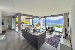 Tenero-Contra: Modern apartment with covered terrace & view of Lake Maggiore for sale