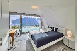 Tenero-Contra: Modern apartment with covered terrace & view of Lake Maggiore for sale