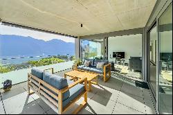 Tenero-Contra: Modern apartment with covered terrace & view of Lake Maggiore for sale