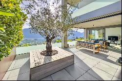 Tenero-Contra: Modern apartment with covered terrace & view of Lake Maggiore for sale