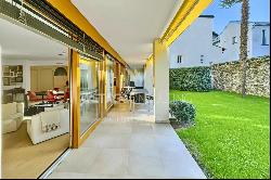 In the heart of Ascona, a modern apartment with a private garden & separate atelier for s