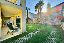 In the heart of Ascona, a modern apartment with a private garden & separate atelier for s