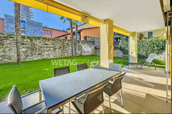 In the heart of Ascona, a modern apartment with a private garden & separate atelier for s