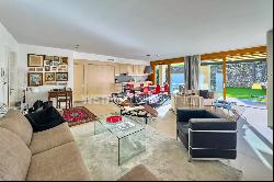 In the heart of Ascona, a modern apartment with a private garden & separate atelier for s