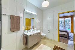 In the heart of Ascona, a modern apartment with a private garden & separate atelier for s