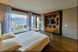 Porza: luxury penthouse apartment with a view of Lake Lugano for sale