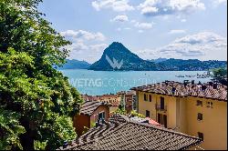 Charming villa with swimming pool & view of Lake Lugano in Lugano-Castagnola for sale