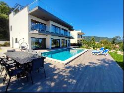 New modern villa near the sea with panoramic sea view and heated swimming pool