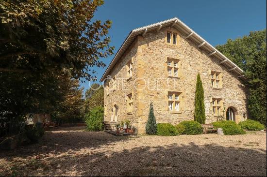 A 14TH CENTURY CHATEAU WITH A SWIMMING POOL AND AN ANNEX