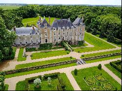 An exceptional listed Louis XIII style chateau set in 40 enclosed hectares with formal Fr