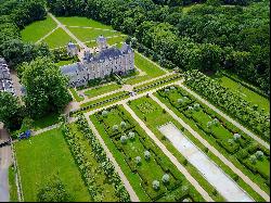 An exceptional listed Louis XIII style chateau set in 40 enclosed hectares with formal Fr