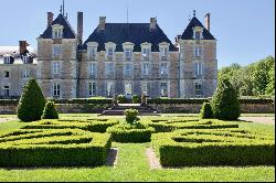 An exceptional listed Louis XIII style chateau set in 40 enclosed hectares with formal Fr