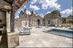 Exceptional 15th-Century ISMH Château : A Majestic Retreat set on a 93-Hectare Estate