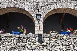 Authentic 13th-century stone farmhouse set in 55 hectares, including 15 hectares of vines