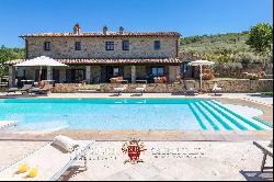 RESTORED FARMHOUSE WITH POOL FOR SALE ON LAKE TRASIMENO, UMBRIA