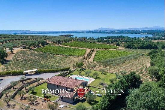 RESTORED FARMHOUSE WITH POOL FOR SALE ON LAKE TRASIMENO, UMBRIA