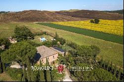 FARMHOUSE WITH POOL FOR SALE ALONG THE RIVER IN TUSCANY, SIENA