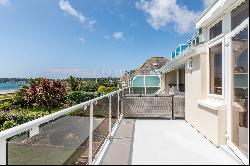 A substantial south facing beach house with superb sea views