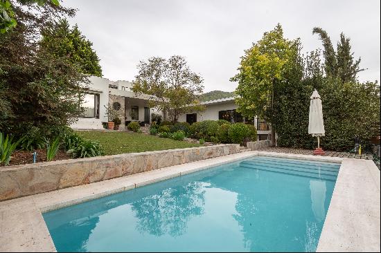 Two story mediterranean-style house in a gated community