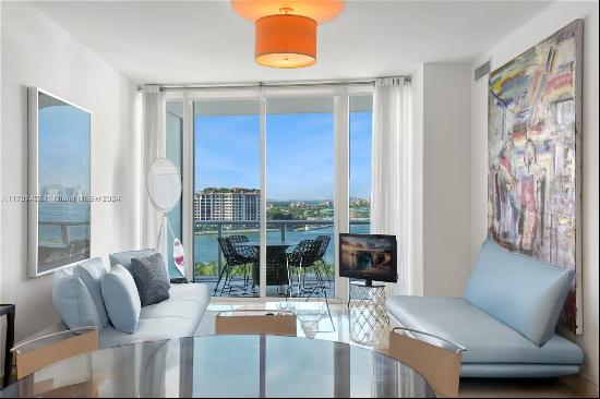 Experience luxury living at Continuum South Beach. Residence 1002 is a rarely available sp