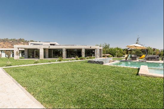 Mediterranean-style house in La Vina Condominium, Chicureo.