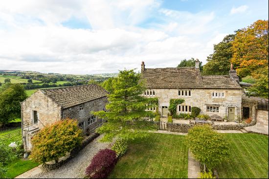 An exceptional Grade II listed property offering extensive accommodation, outbuildings, an