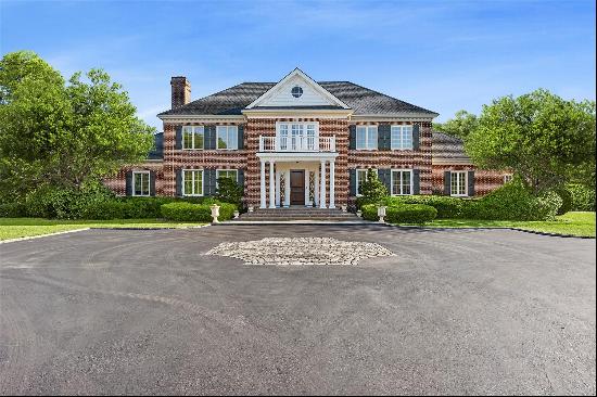 10 Colonial Drive is a stunning Georgian estate set on 5 impeccably landscaped acres in th