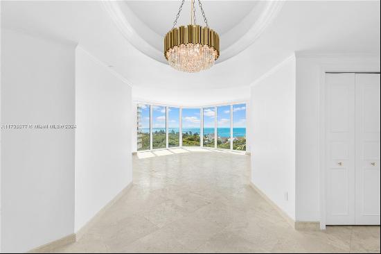 Step into luxury living at Portofino Tower in the prestigious South of Fifth neighborhood!