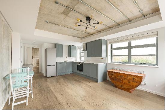 A newly developed first floor, one bedroom apartment benefiting from open plan living.