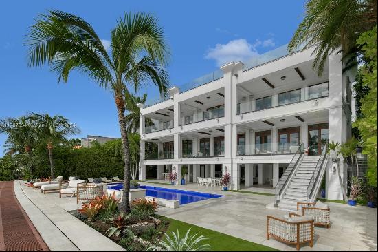 Experience luxury living in this exquisite 3-story waterfront estate, offering 100 of prim