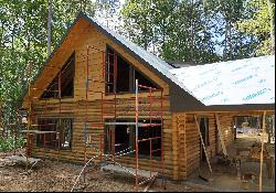 Custom Built Log Home that Offers All the Joys of Mountain Living