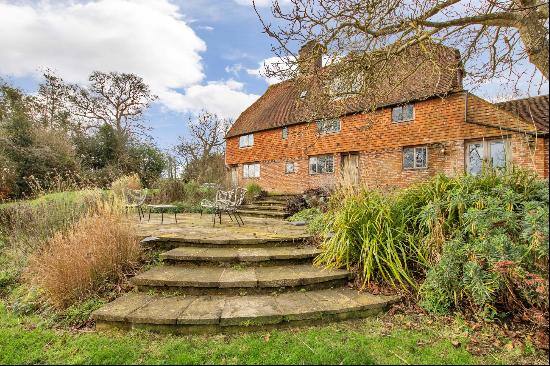 A beautifully updated Grade II listed country home with far reaching countryside views