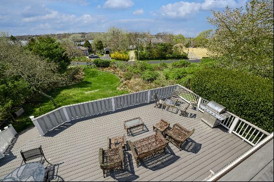 Situated in the middle of Montauk this five-bedroom two-bath home with sprawling yard and 