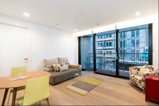 A modern, lateral one bedroom flat with a private balcony to let in the Plimsoll Building.