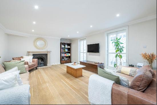 An exceptional, light-filled apartment boasting a large reception and two well proportione