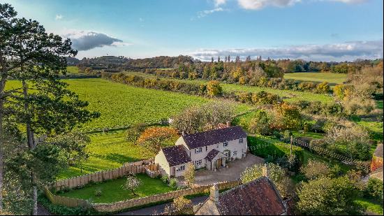 An attractive detached 4 bedroom family home, in arguably one of the best positions within