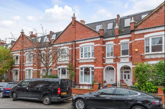 A 'Long-Back' Lion House with a south-west facing garden situated on this incredibly sough