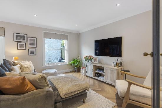 A high-specification three-bedroom mews house on Mustow Place.