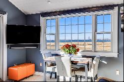 Own the Best of Oceanside: Top-Floor Condo with Panoramic Cape Cod Bay Views