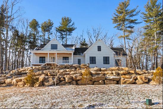 Introducing an exquisite new construction home nestled in the quaint town of Old