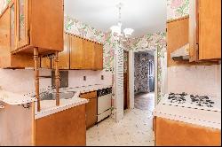 “ DETACHED TWO STORY HOME IN THE REGO PARK CRESCENTS”