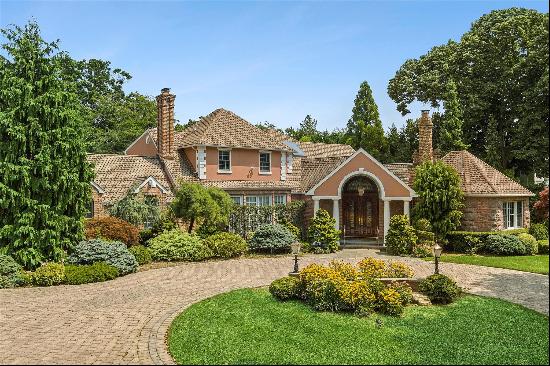 Welcome to 1331 Harbor Road, a true jewel nestled in the heart of Hewlett Harbor, NY. This