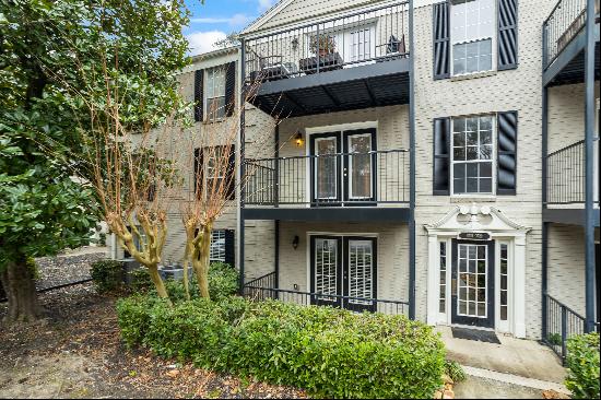 Exceptional Two Bedroom Condo Nestled in Sought-after Gated Vinings Community