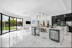 Expansive family home with private swimming pool for rent in Oxshott