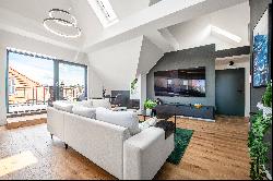 Stylish design: recently renovated 2-room apartment with large roof terrace