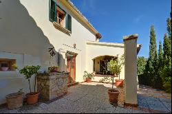 Natural stone finca with views into the valley